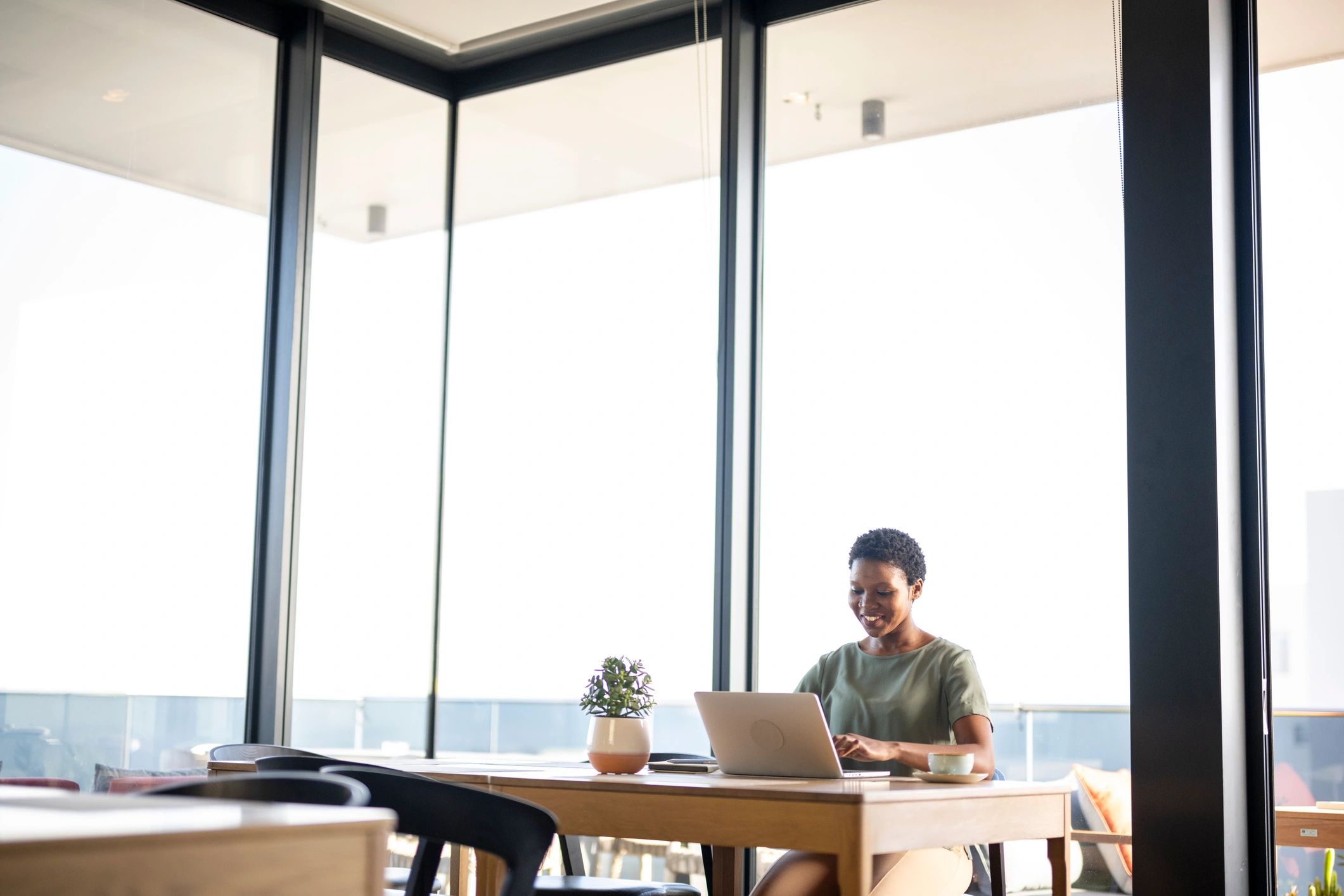 Professional virtual assistant using a laptop