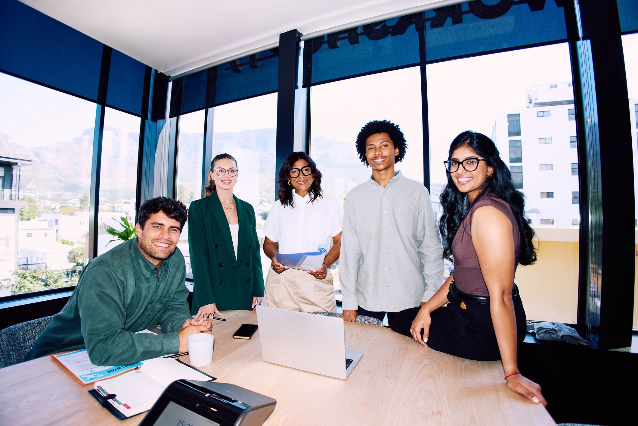 Business team collaborating at a meeting table
